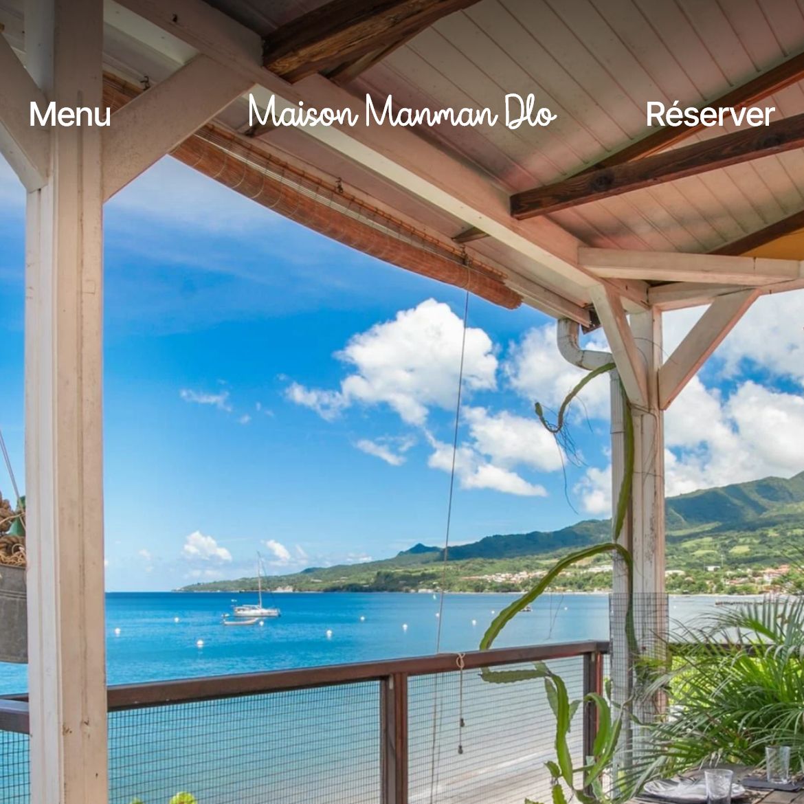 Page d’accueil du site de la Maison Manman Dlo, affichée sur téléphone